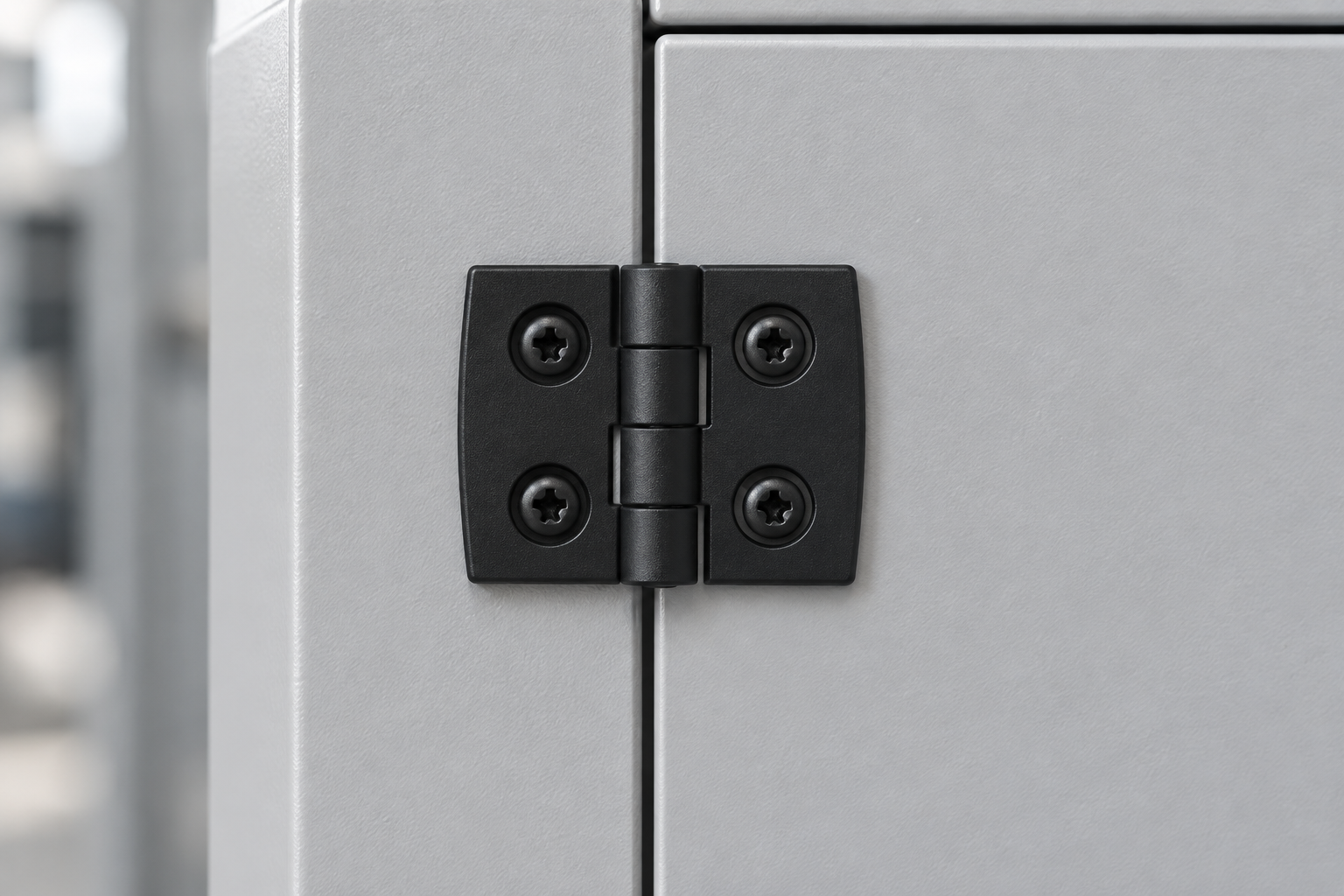 Black plastic Qiyi hinge installed on a light gray industrial enclosure door for selection reference